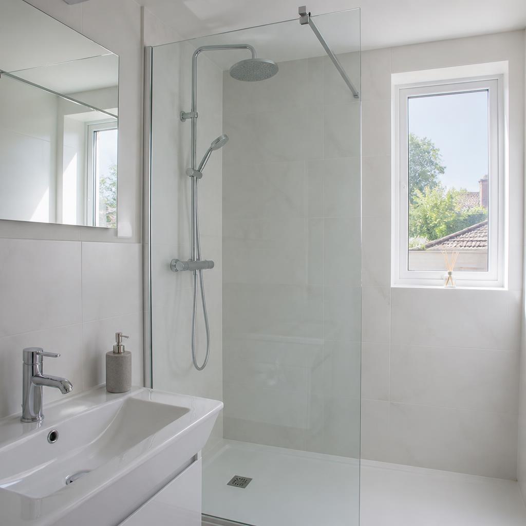 Modern bathroom with chrome shower and basin